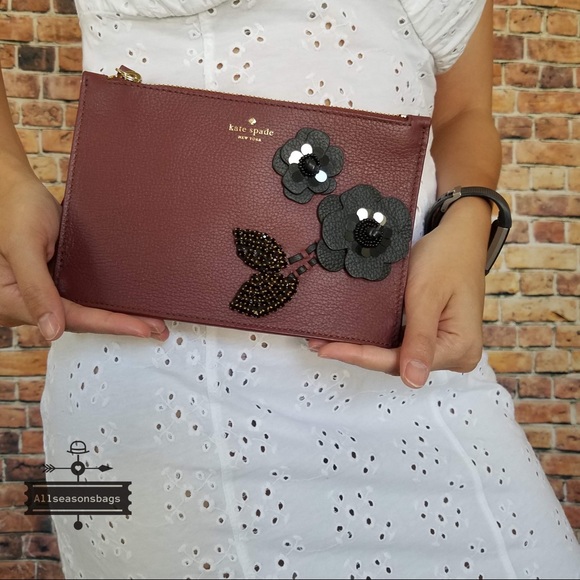 kate spade Handbags - Kate Spade on purpose floral mini leather wristlet